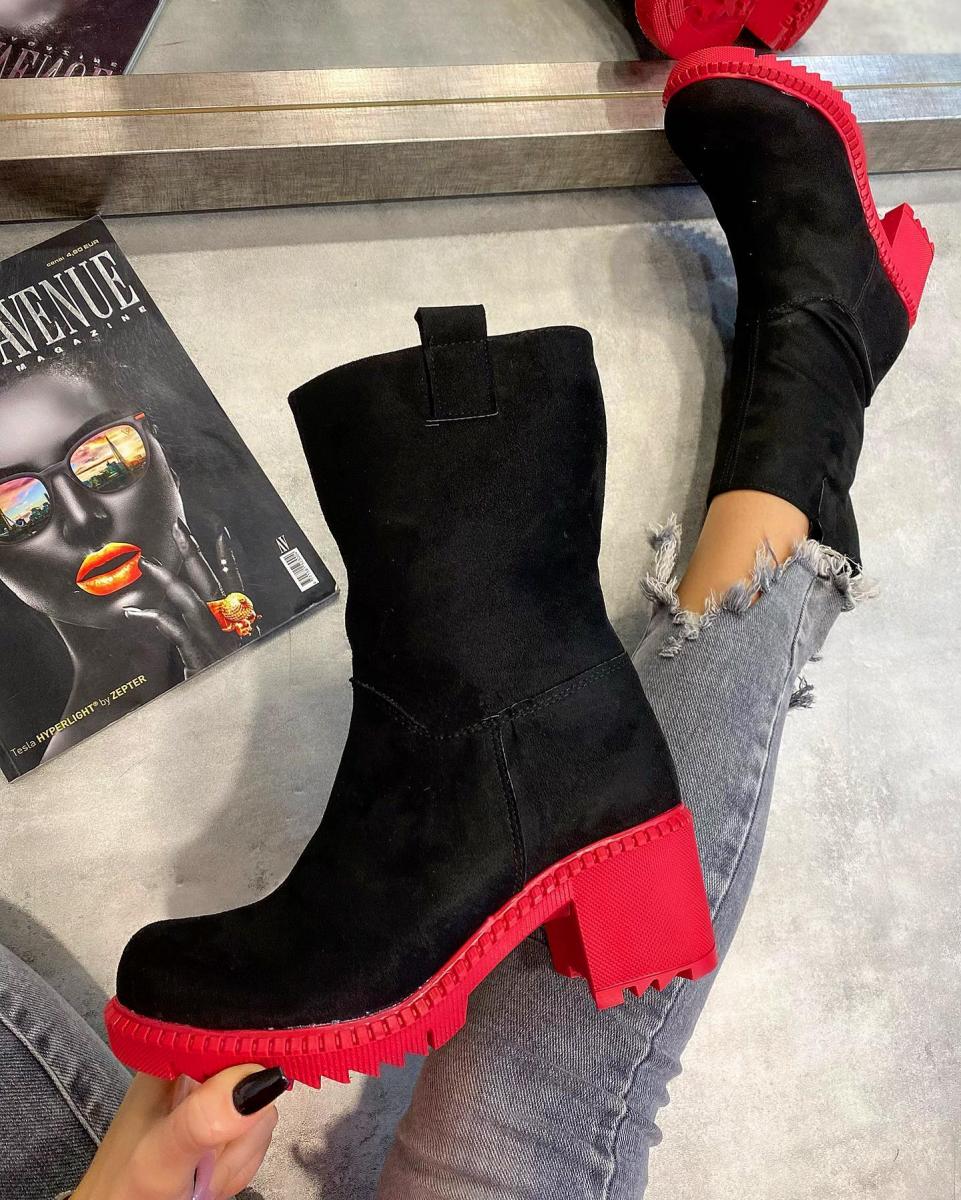 black boots with red soles